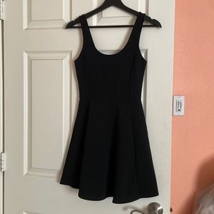 Divided black skater dress